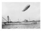 U.S.S. Patoka and Shenandoah Blimp Overhead