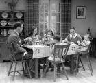 1930s Family Of 6 Sitting At The Table