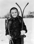 1930s Little Girl Standing Holding Skis