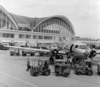 1950s 1960s Propeller Airplane On Airport Tarmac