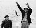 1950s 1960s Boy Fishing With Father Or Grandfather