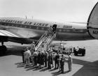 1950s Group Of Passengers Boarding Airplane
