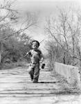 1940s Boy Walking Down Country Road