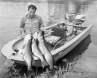 1970s Man In Small Motorboat