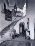 1920s Upscale Home Entry With Spiral Staircase