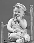 1940s Baby Sitting Chair Holding Cigar