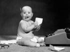 1960s Eager Baby Accountant Working At Adding Machine