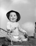 1960s Baby Girl Wearing Fishing Hat