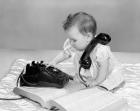 1960s Baby Girl With Telephone Book