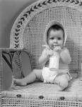 1940s Baby Sitting In Wicker Chair