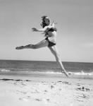 1950s Woman In Bikini Running