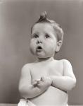 1950s Worried Baby Looking Up Uncertain