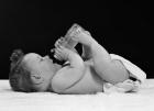 1950s Baby Lying On Back Drinking From Bottle