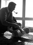 1950s Silhouetted By Window Light  Father Pipe In Mouth