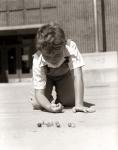 1950s Smiling Boy On School Yard Ground Playing