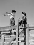 1950s Two Young Boys Dressed As Cowboys