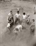 1950s Boys Fight In Sand Lot On Baseball Field