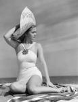 1930s 1940s Woman In Bathing Suit On Beach Wearing Big Hat