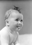 1940s Cute Baby Sticking Out Tongue