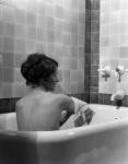 1920s 1930s Brunette Woman Sitting In Luxury Bathtub