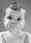 1950s Baby Making Funny Face With Eyes Wide Open
