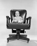 1960s Baby Sitting In Executive Office Chair