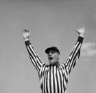 1950s Football Referee Making Touchdown Signal