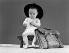 1940s Baby In Fedora Seated On Stool