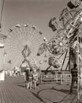 1960s Teens Looking At Amusement Rides