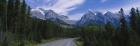 Two lane highway passing through a landscape, Alberta