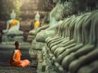 Young Buddhist Monk praying, Thailand