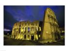 Colosseum lit up at night, Rome, Italy