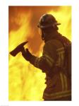 Side profile of a firefighter holding an axe