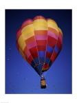 Low angle view of a hot air balloon rising, Albuquerque International Balloon Fiesta, Albuquerque, New Mexico, USA