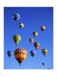 Low angle view of hot air balloons rising, Albuquerque International Balloon Fiesta, Albuquerque, New Mexico, USA