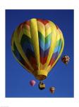 Low angle view of hot air balloons rising, Albuquerque International Balloon Fiesta, Albuquerque, New Mexico, USA