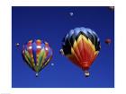 Low angle view of hot air balloons rising, Albuquerque International Balloon Fiesta, Albuquerque, New Mexico, USA