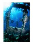 Scuba diver investigating shipwrecks