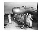 Group of army soldiers standing in a row near a fighter plane, B-29 Superfortress