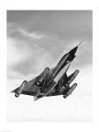 Low angle view of a bomber plane in flight, B-58 hustler