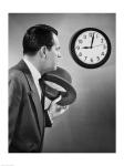 Businessman looking at clock