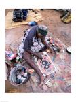 Female artist painting, Alice Springs, Northern Territory, Australia