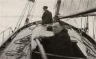 Hilaire Belloc in his boat (b/w photo)