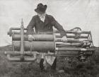 Hiram Maxim holding one of his flying machine engines, From The Strand Magazine published 1894.
