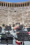 Aspendos, Antalaya Province, Turkey. The Roman theatre which is still in use. Orchestral equipment on stage in preparation for a performance.