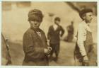 Joe (Jose) Mello, aged 8 or 9 works as a mill sweeper in New Bedford, Massachusetts, 1911 (b/w photo).