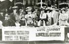 Suffragettes at a campaign stand, c.1910 (b/w photo)