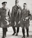 Adolf Hitler with Wilhelm Brückner, centre, and Julius Schaub. From I Knew Hitler by Kurt G.W. Ludecke, published 1938.