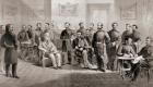 General Ulysses S. Grant (seated centre right) and General Robert E. Lee (seated centre left) with their respective staff at the Appomattox Courthouse, Virginia where General Lee surrendered the Army of North Virginia and thus ended the American Civil War