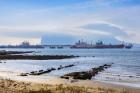The Rock of Gibraltar covered by its famous Levanter cloud, seen across Bay of Algeciras near La Linea de la Concepcion, Cadiz Province, Andalusia, Southern Spain (photo)